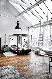 Metal bed in the loft style