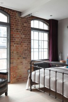 Steel bed in the loft style