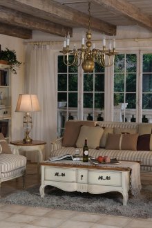 Living room with large windows in provence style