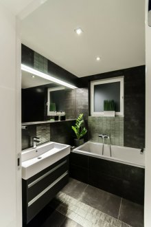 Dark monochrome bathroom interior