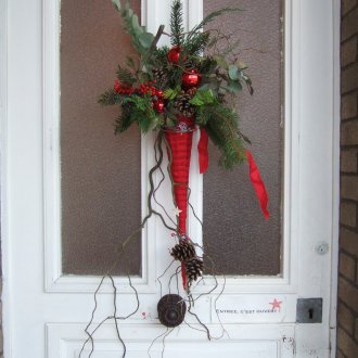 Christmas door decoration with cones