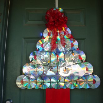 Christmas tree made of CDs on the door