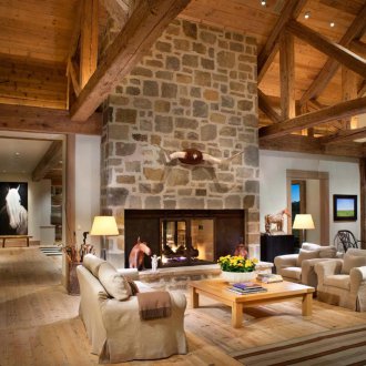 Living room with a rustic fireplace