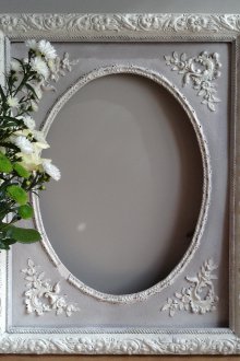Decoración de marco de fotos de estuco