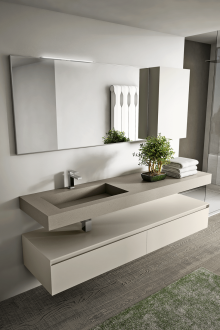 Muebles para baño con tablero de hormigón.