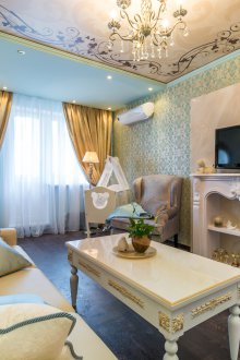 Children's area for a newborn in a classic living room