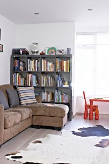 Children's area for a newborn in a bay window