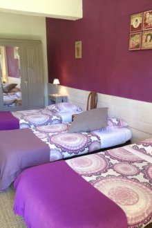 Purple nursery design for three children