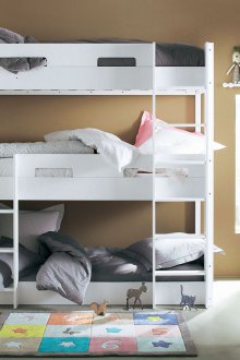 Bed in a nursery for three