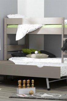 Transformer bed in a nursery for three
