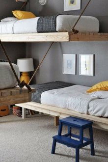 Children's room for three with a hanging bed