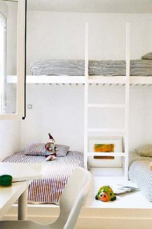 Nursery for three children in a Scandinavian style