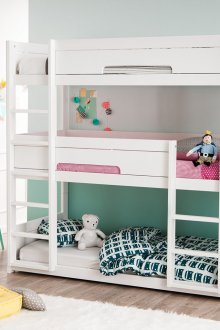 Children's room for three children with a three-story bed
