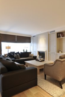 Budget repairs in a studio apartment with furniture in the living room