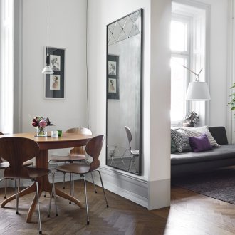Budget repairs in a studio apartment with a mirror
