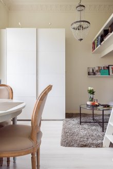 Bedroom in a studio apartment with an attic bed