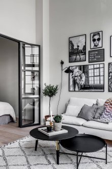 Bedroom in a studio apartment with doors