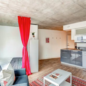 Bedroom in a studio apartment