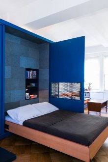 Bedroom in a one-room apartment in modern style