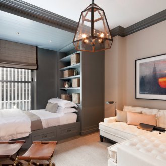 Bedroom in a studio apartment in a niche