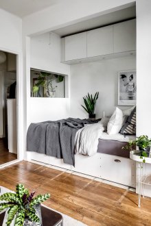 Bedroom in a studio apartment with built-in bed