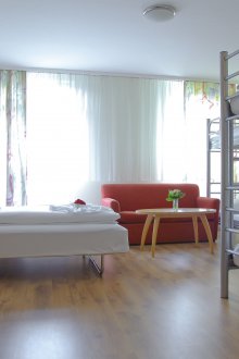 Bedroom in a studio apartment for a family