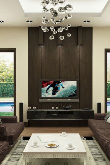 Wohnzimmerinnenraum mit schwarzem flachem Fernsehapparat