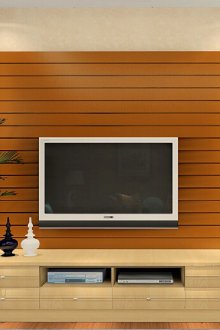 Fernsehapparat auf dem Hintergrund einer dekorativen Wand