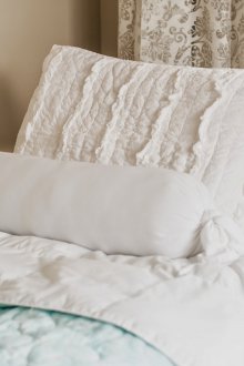 Almohada cojín en el dormitorio