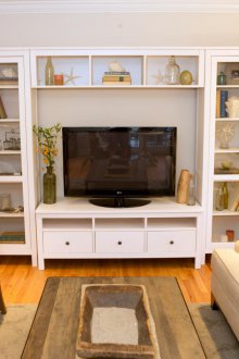 Shelving in the living room with glass