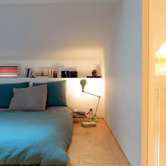 Podio da letto in soffitta