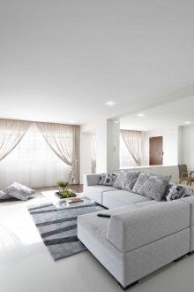 White interior with corner sofa