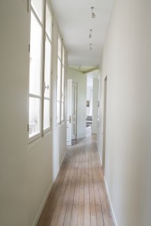 White interior of narrow corridor