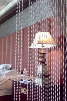 Zonage avec rideaux de perles