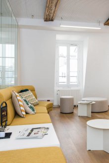 Living room kitchen design with sofa