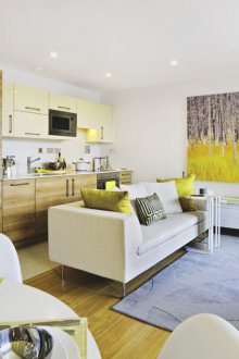 Living room kitchen design with yellow decor