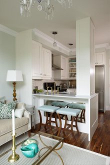 Living room kitchen design with gold