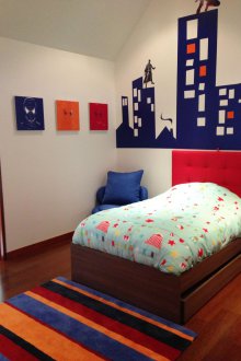 Wall decor with a children's drawing of the city