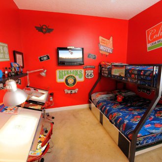 Decor of a kids room with red walls