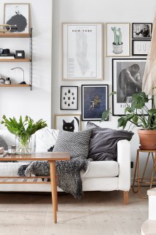 Scandinavian-style studio apartment with paintings
