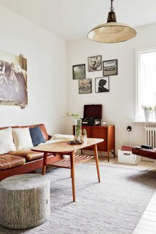 Scandinavian-style studio apartment with leather furniture