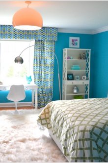 Multi-colored curtains with lambrequins in the bedroom